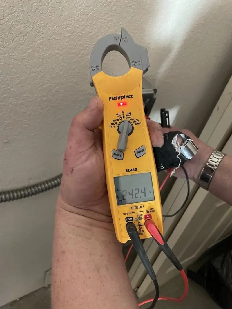 Voltage testing with clamp meter during Generator Installation in Bangor